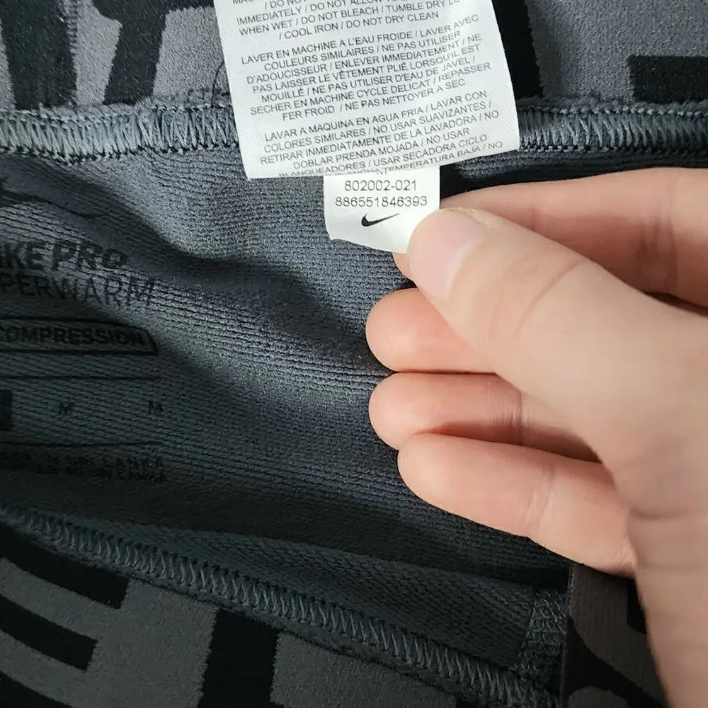 Nike Pro compression pants spell out size medium gray and black